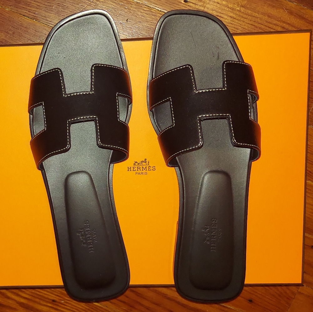 Authentic Black Hermes Oran Slides w/box & dustbag Size 39 1/2. Worn once.
